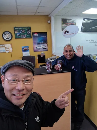 EJ Auto Tinting team in the shop